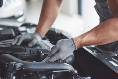 auto-mechanic-working-garage-rep-1024x683.jpg