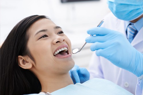 dentist-performing-bruxism-treatment-in-ne-calgary-ab-1.jpg