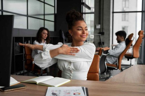 medium-shot-woman-stretching-work-1.jpg