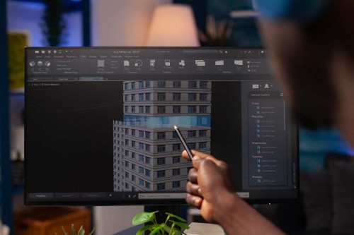 architect-engineer-pointing-architectural-building-prototype-analyzing-construction-model-computer-businessman-designer-working-remote-from-home-real-estate-project-modeling-sketch-1.jpg
